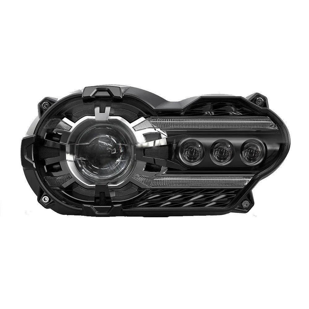 Black LED motorcycle headlight unit showing front lens and shell, with scale showing dimensions.