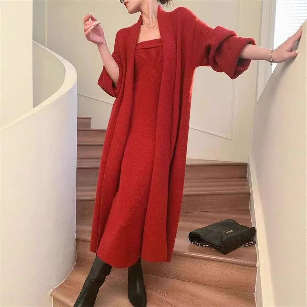 Women's grey flocked knitted long cardigan worn over matching dress in a casual two-piece set.