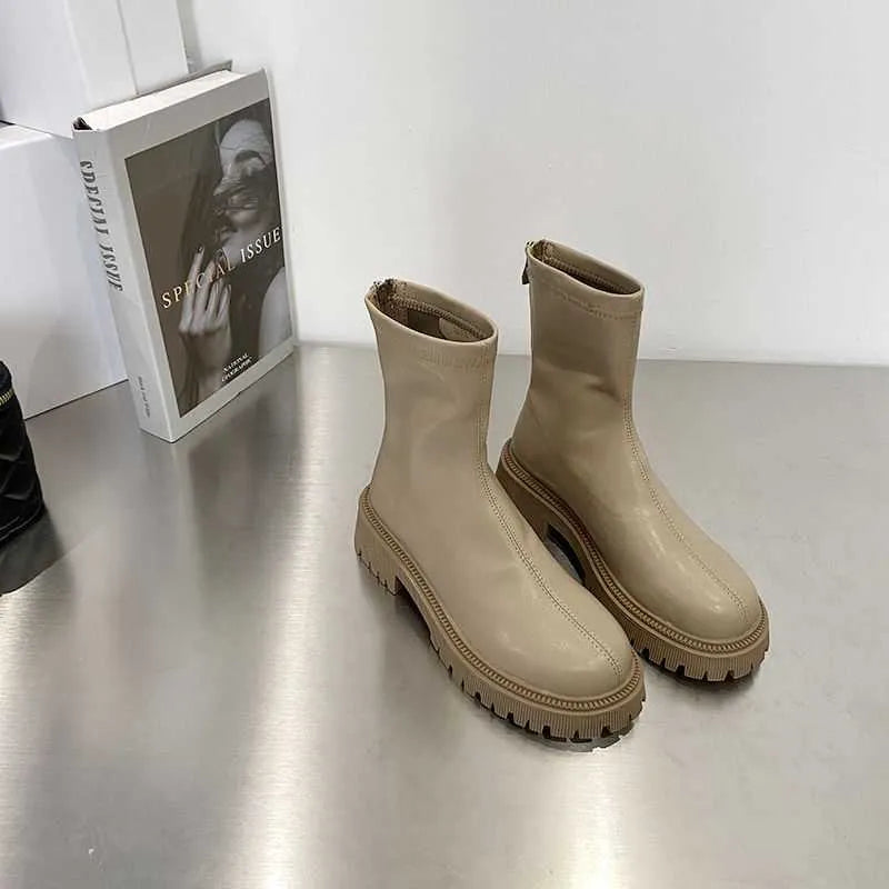 Women's fashion Martin boots with warm thick sole, round toe, and PU upper in black colour option