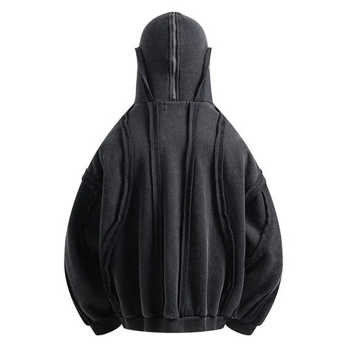 Black loose-fit zip-up hooded cardigan jacket with abstract pattern and padding on a hanger.