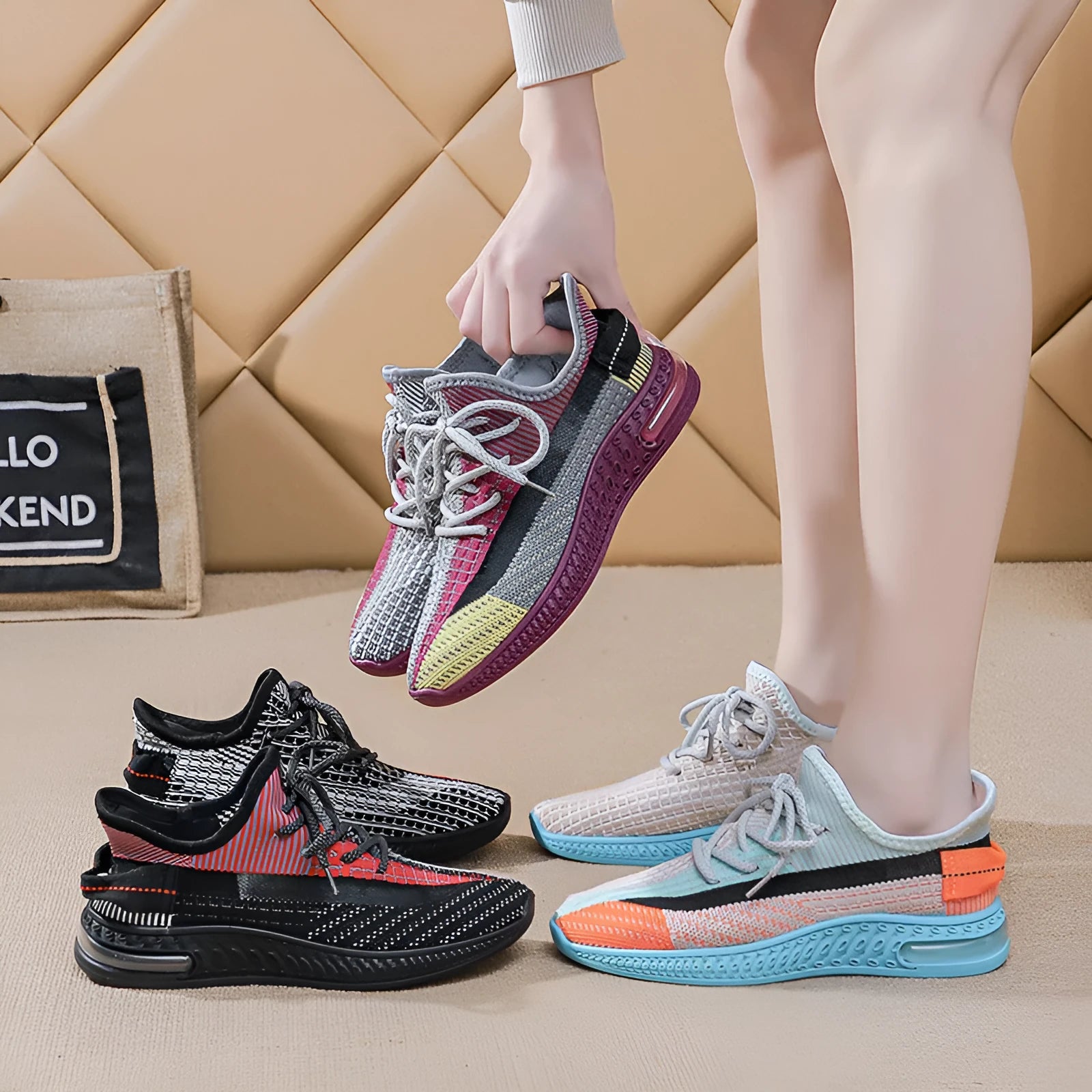 Women's lightweight casual running shoes in purple, black, or orange with plastic sole and lace-up front.
