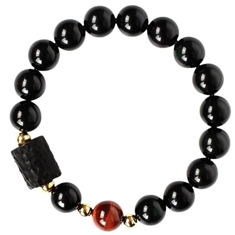 Handmade obsidian bracelet with 10mm yellow tiger eye beads in circular retro design