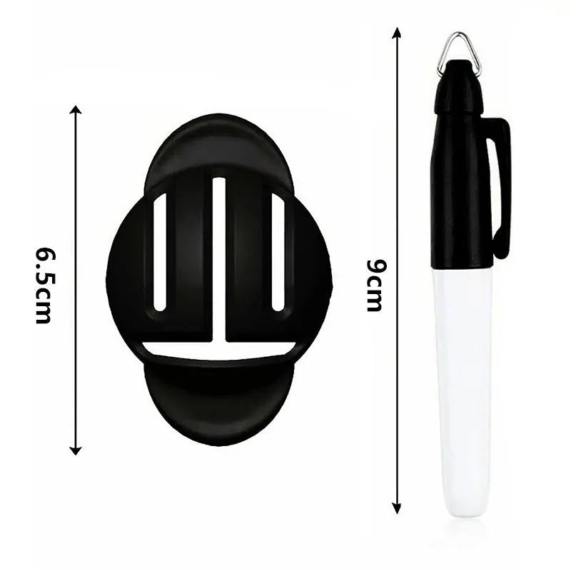 White golf ball alignment tool with four black adjustable scriber arms and a blue drawing pen on a green.