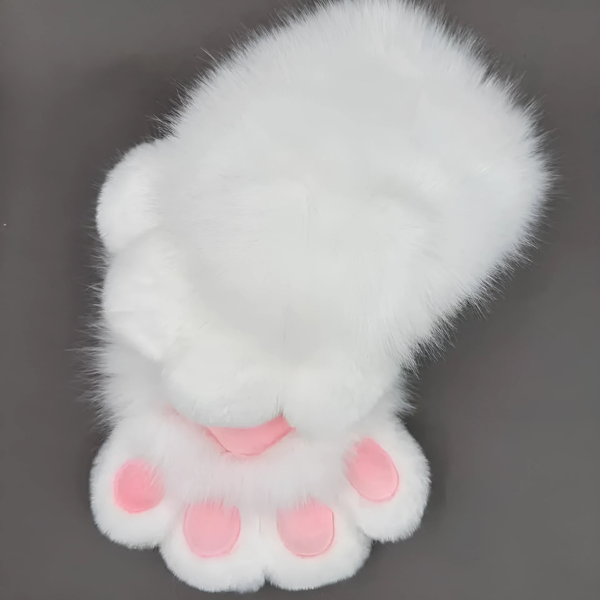 A pair of colourful animal claw cosplay gloves in nylon material on a neutral background.