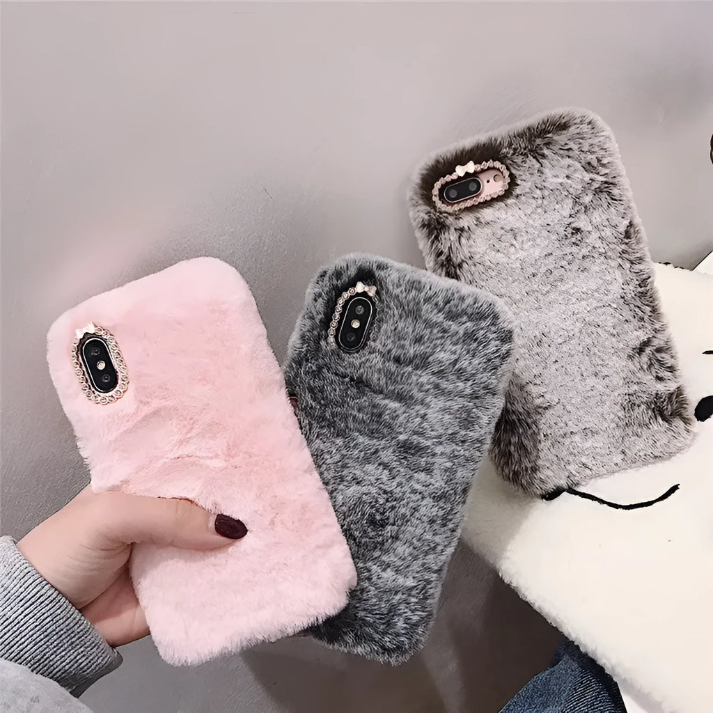 Silicone iPhone protective case with rhinestone decoration and a soft plush bottom shell.
