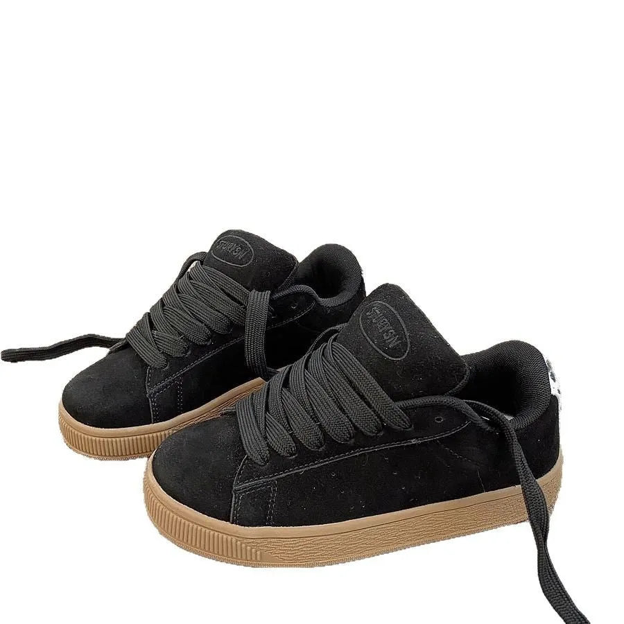 Black retro low-top sneakers with waterproof platform sole and round toe design