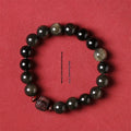 Hand-woven vintage bracelet with 10mm golden obsidian beads in retro style with national design elements
