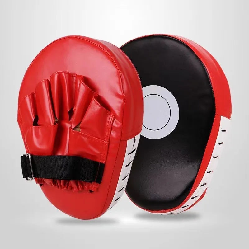 Set of PU punch mitts for boxing and Muay Thai training in curved, flat, and arc-shaped styles.