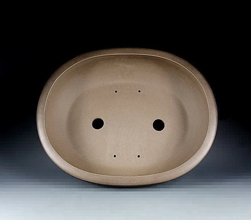 Handmade oval purple sand ceramic flowerpot measuring 50x39.5x16cm for desktop or ground plant display