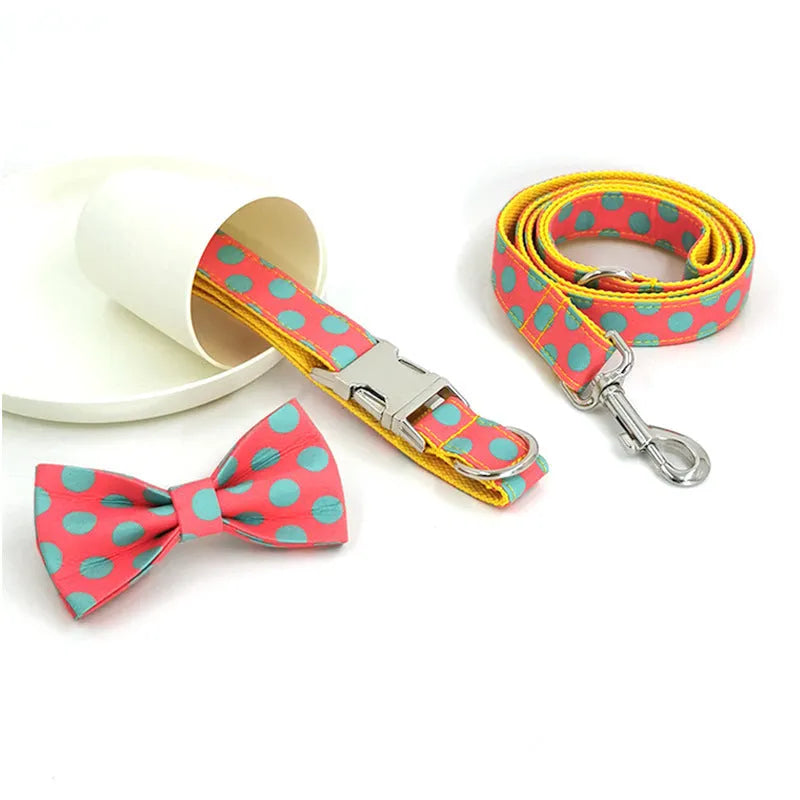 Yellow polka dot dog collar and lead set with bow accents and five size options