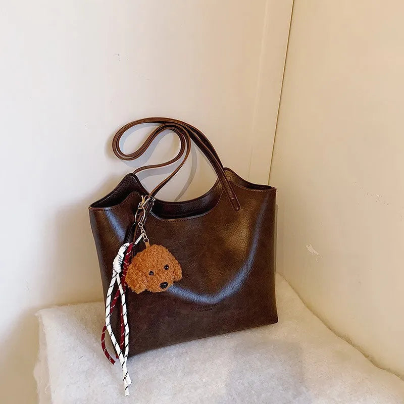 Women's PU retro commuter shoulder bag in horizontal square shape with stitching and detachable ribbon pendant