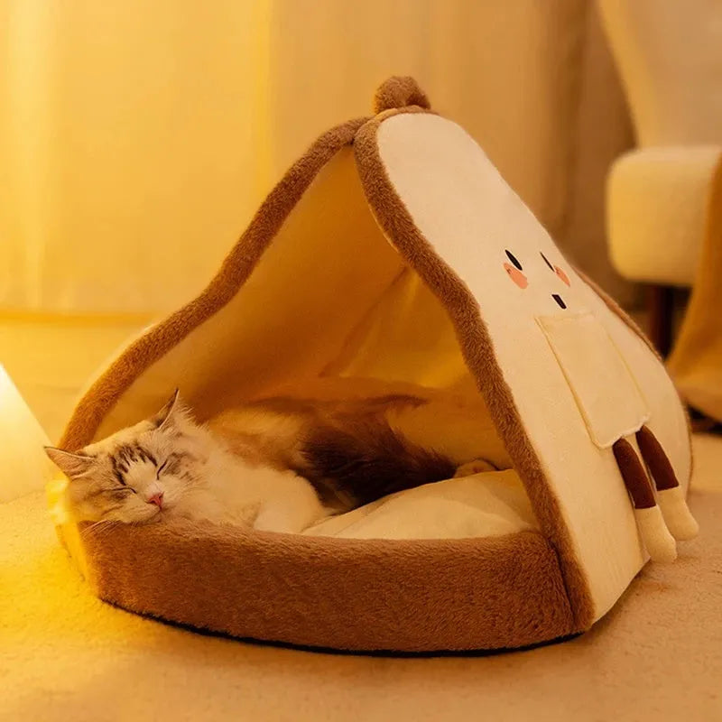 Green enclosed cat tent bed with removable blanket, shown in a large size for scale.