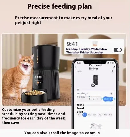 Black automatic pet feeder with digital display and food hopper on a wooden floor.