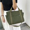 Canvas tote bag with multiple compartments in Army Green colour showing internal organisers