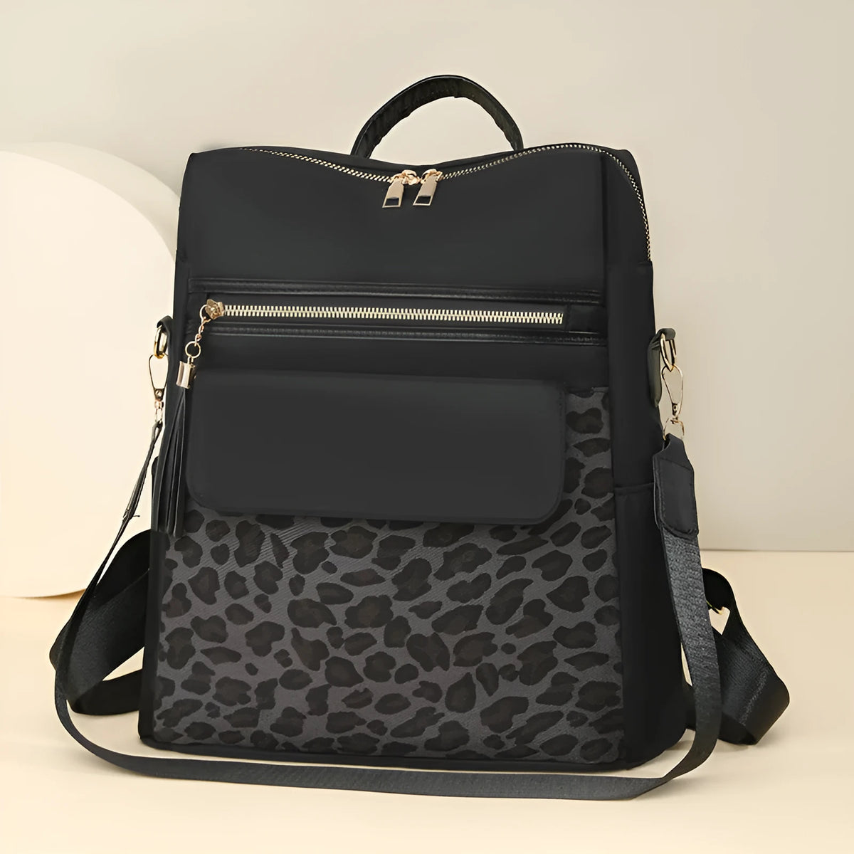 Leopard print women's large capacity nylon backpack in black, brown or beige with stitching and splicing.