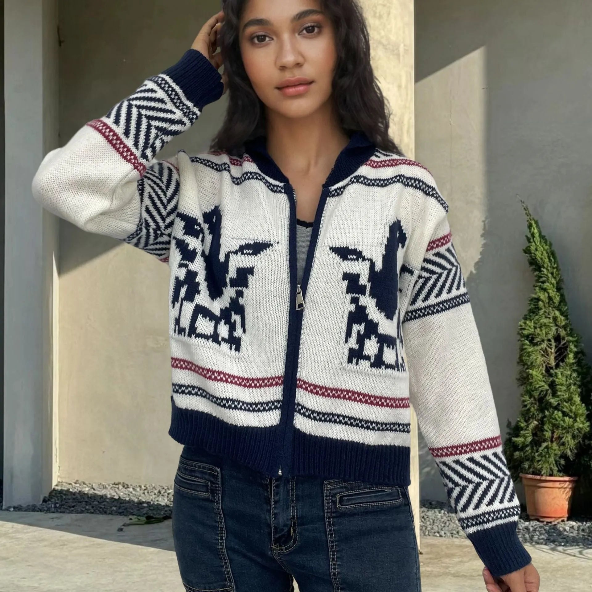 White women's zip-up cardigan with a lapel collar and a jacquard contrast stripe pattern.