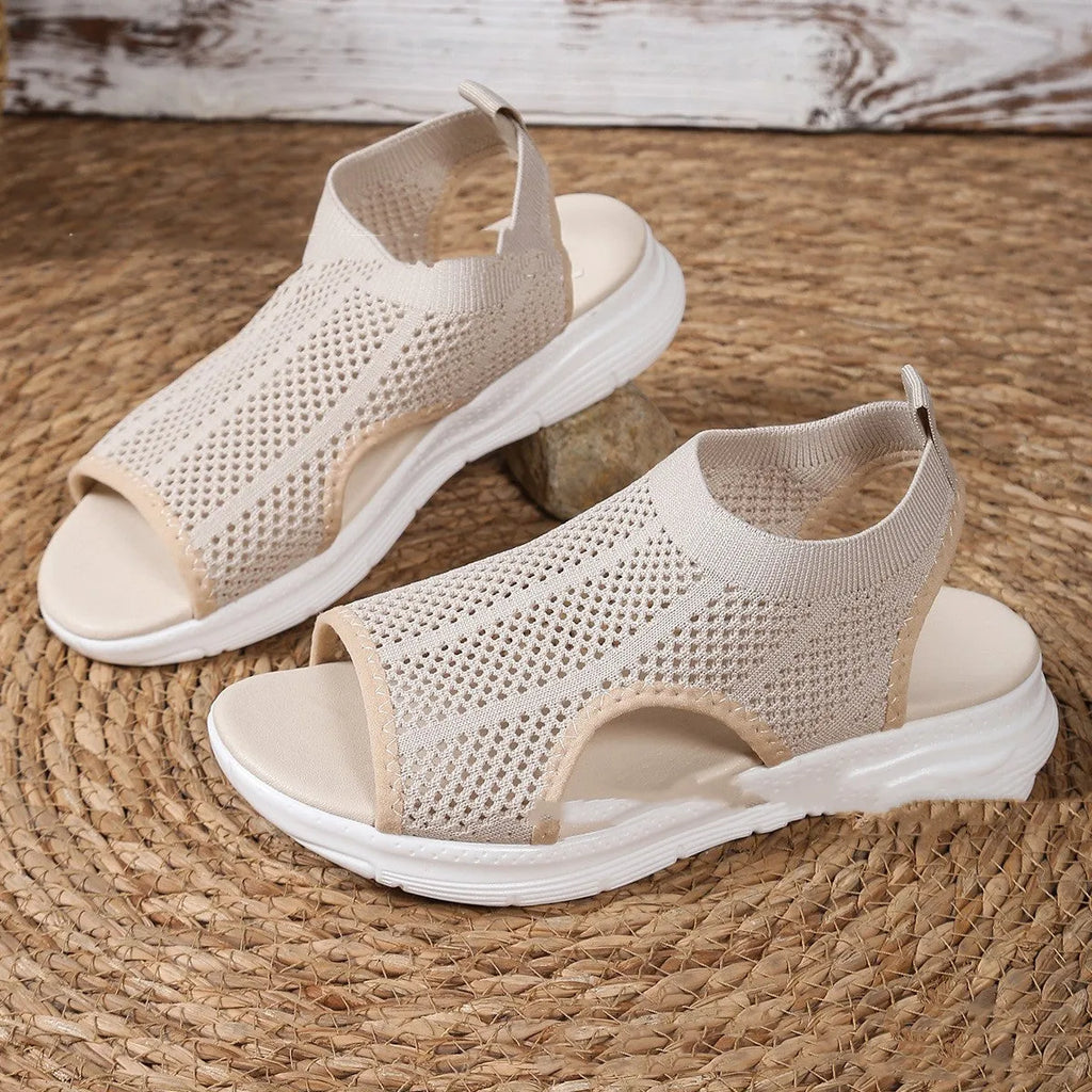 Women's platform sports sandals in black, white, or pink with rubber sole and mesh lining