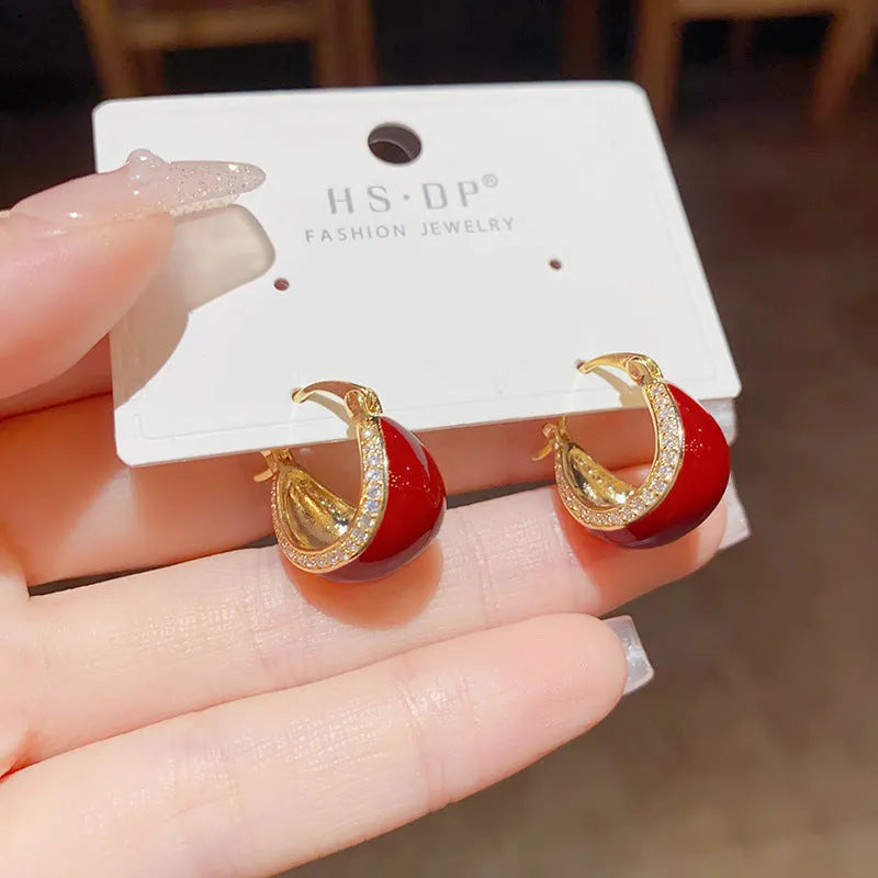 Pair of retro copper earrings with micro-inlaid drip oil design and thick real gold plating in geometric shape