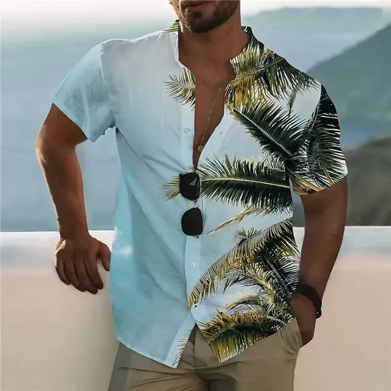 Man wearing a loose-fit floral print short sleeve cardigan shirt in a summer setting.