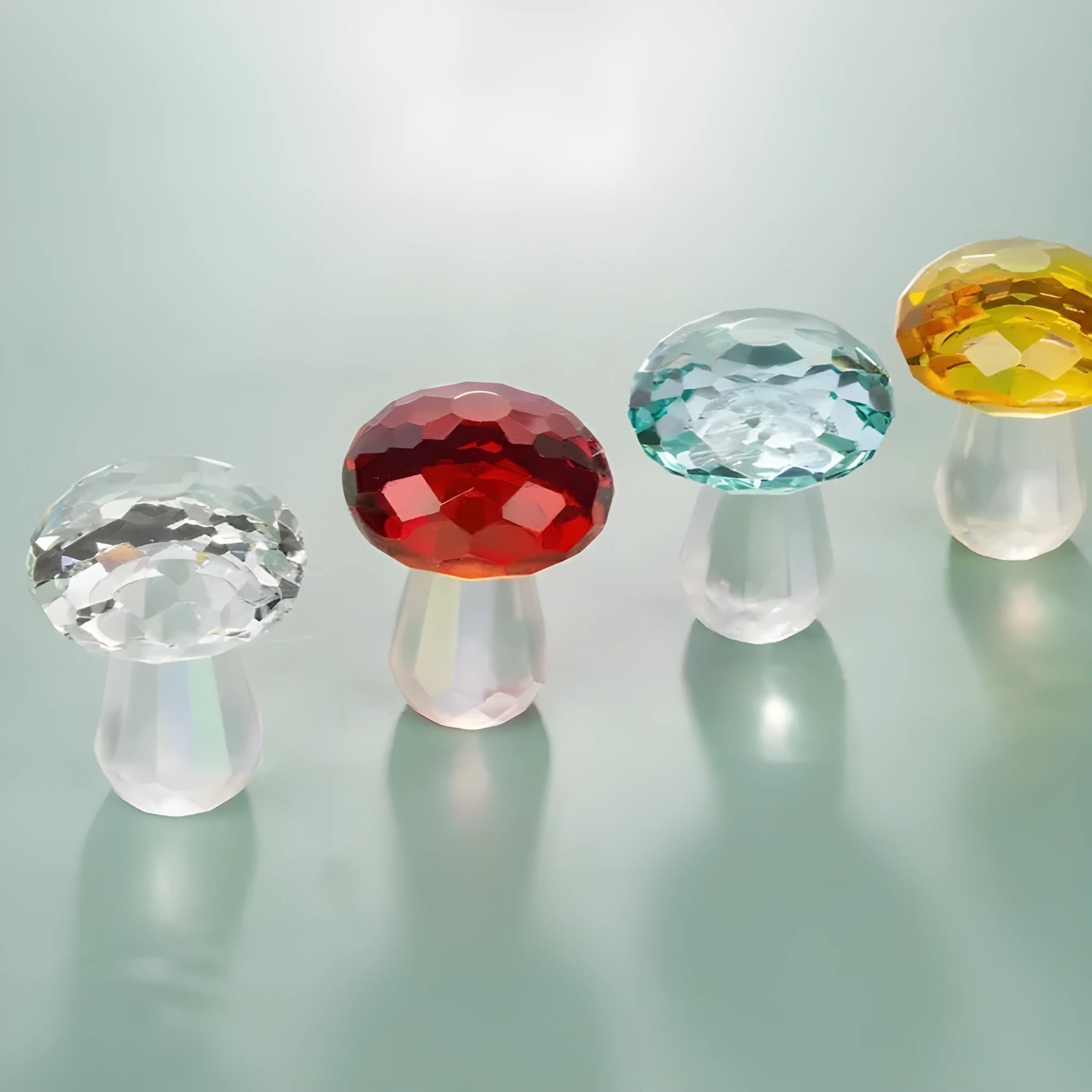 Modern geometric crystal mushroom decoration in transparent, green, red, or yellow, 40 by 53 millimetres.