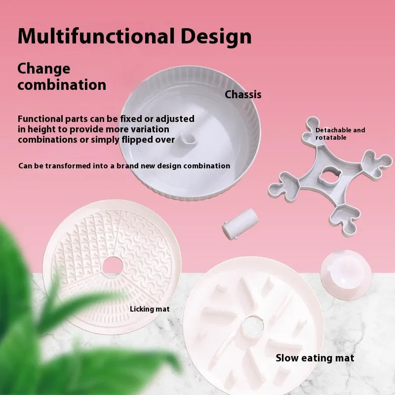Grey interactive pet slow feeder bowl with rotating centre holding a green silicone licking mat on a kitchen floor.
