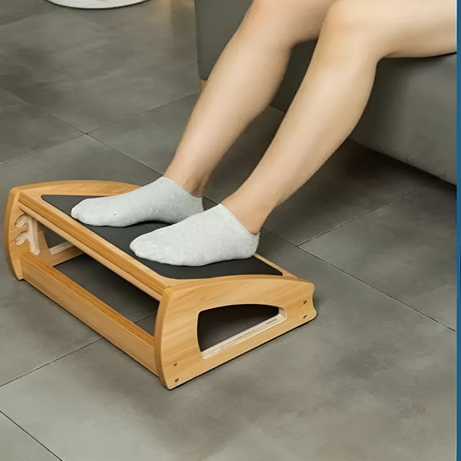 Wooden bamboo office desk footstool in natural wood colour with modern simple design.