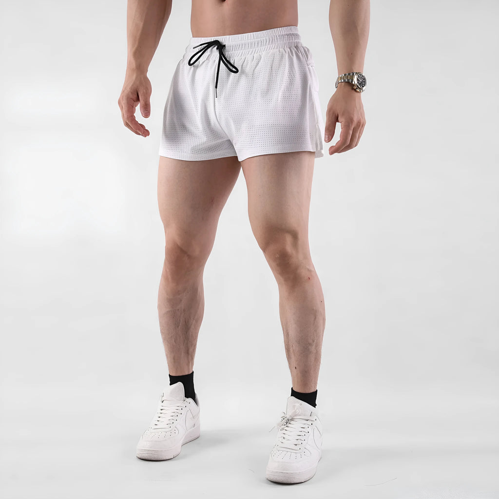 Man wearing black quick-drying nylon summer shorts for sports.