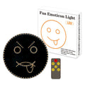 Black car rear window LED expression light showing orange smiley face pattern with remote control