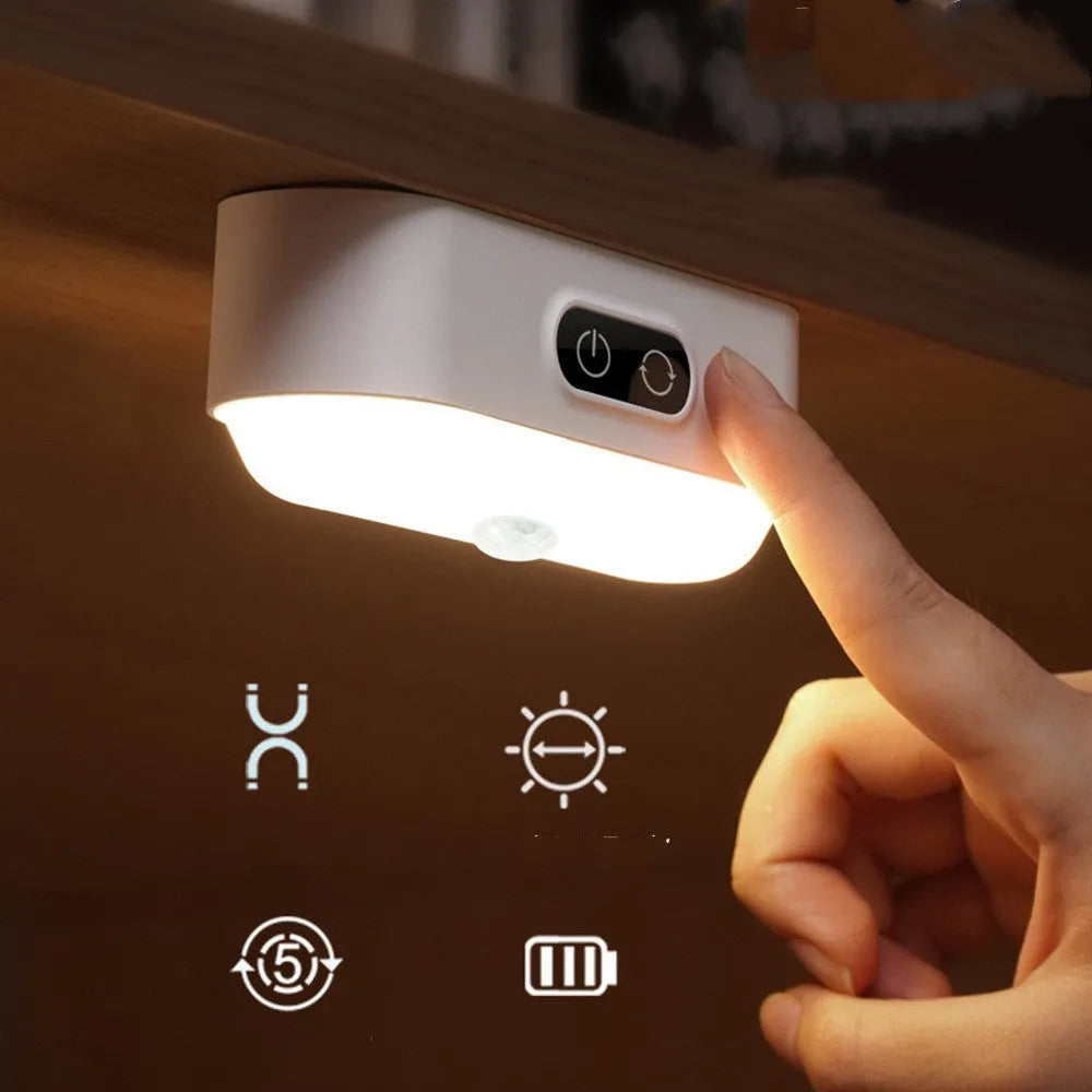 White magnetic USB rechargeable LED night light with touch buttons for dimming and colour temperature adjustment