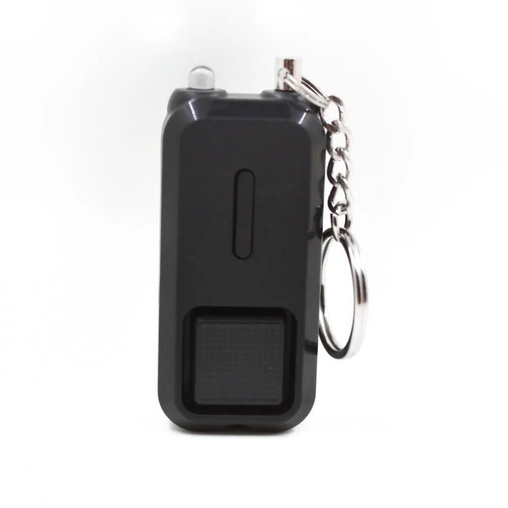 Personal safety alarm measuring 65x30x12mm in pink colour with 130dB sound