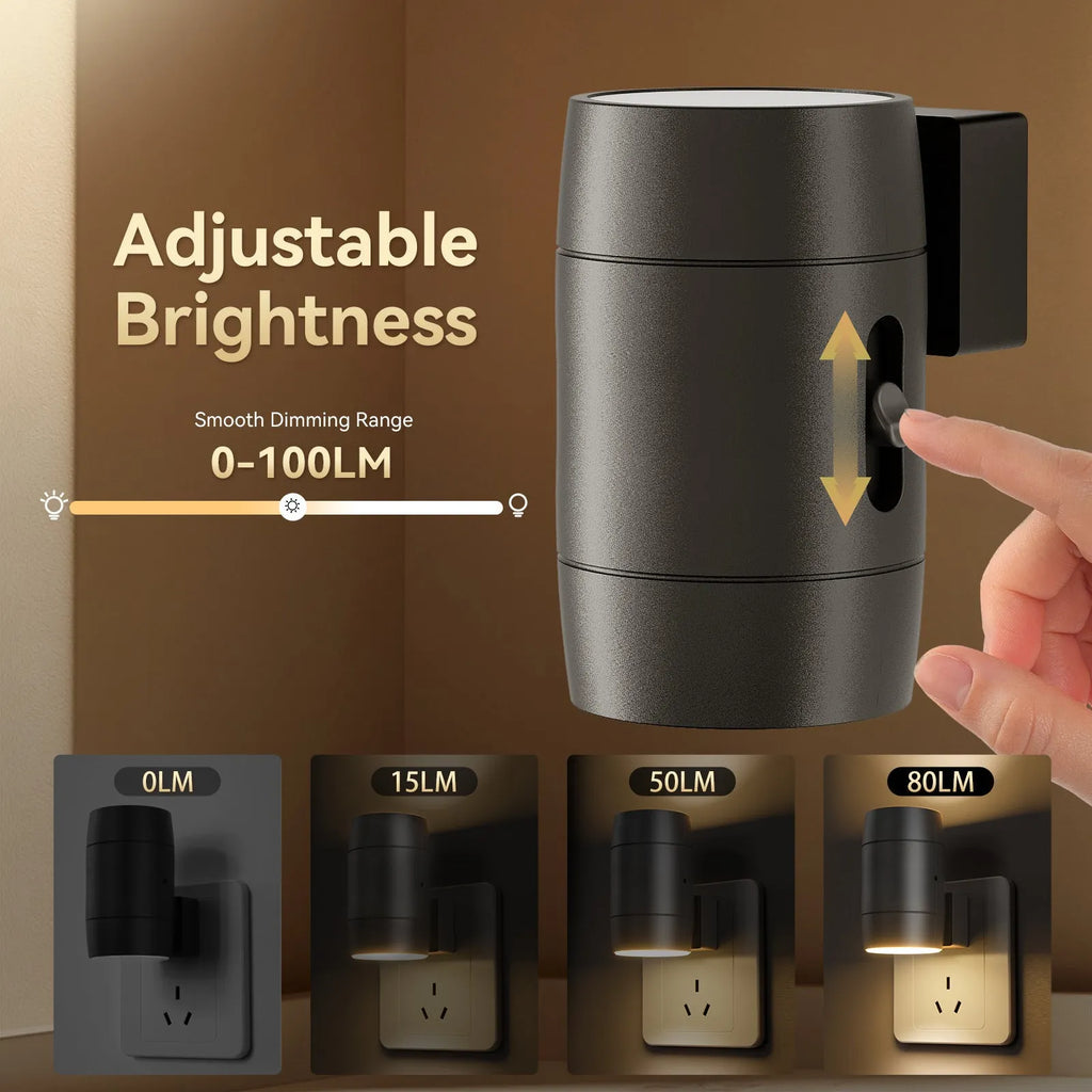 Small white plug-in night lamp with adjustable dial and rotatable light head on a grey background.