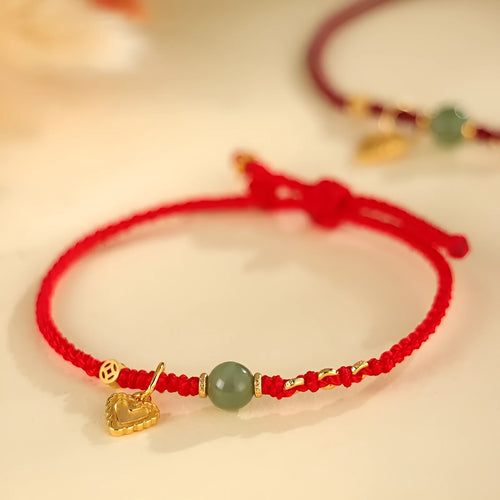 Handmade 925 silver and Hetian jade woven bracelet for women with red strap