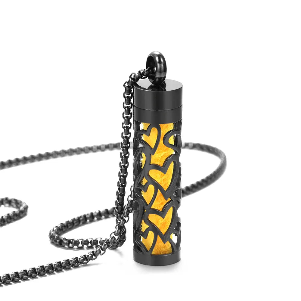 Stainless steel cylindrical heart-shaped hollow pendant necklace on a chain with geometric design