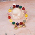 Hand-woven agate bracelet with Swallowing Gold Beast design on 10mm beads