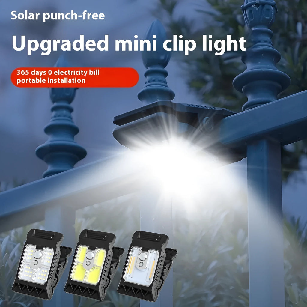 White intelligent motion sensor clip lamp mounted on a shelf edge.