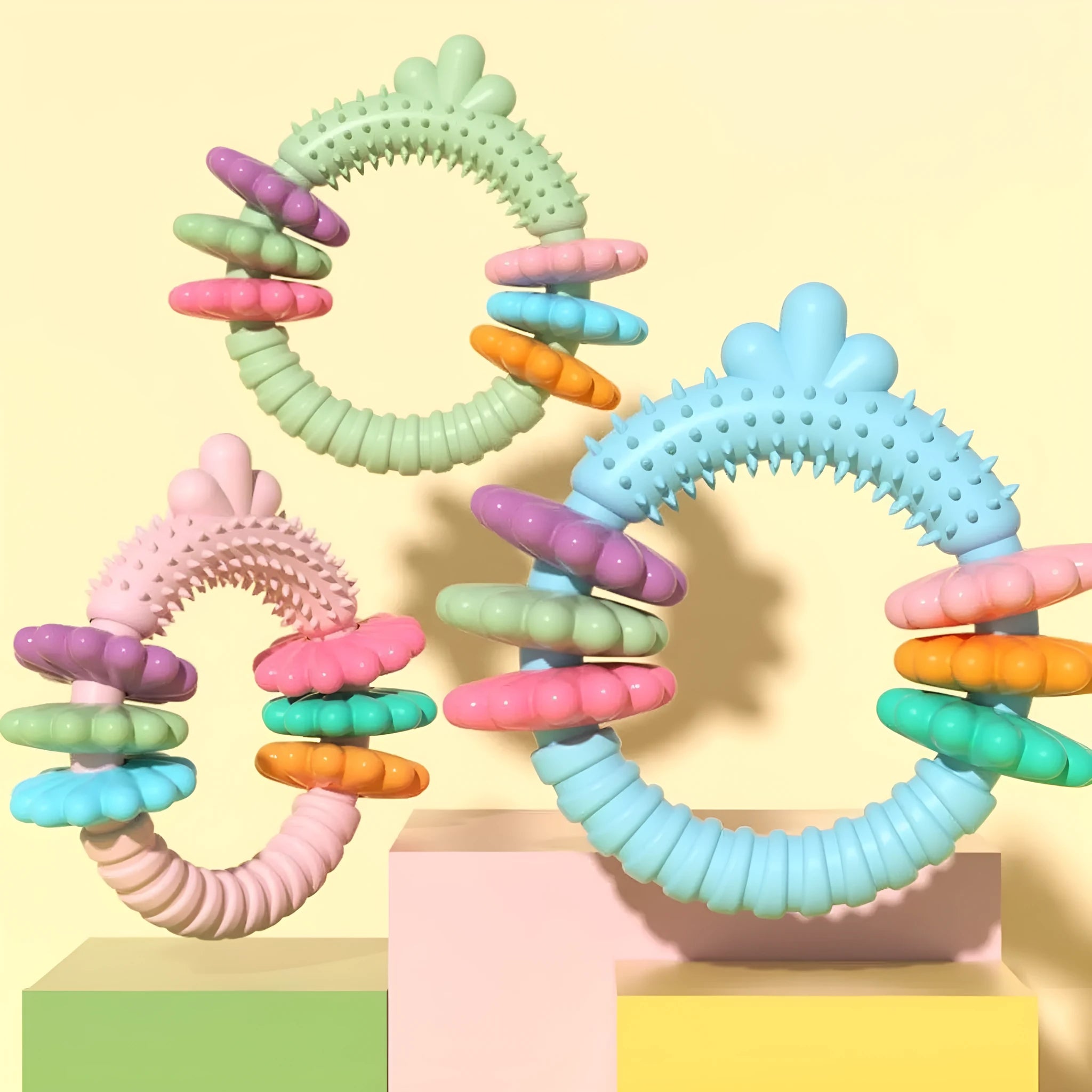 Blue TPR rubber chew ring dog toy for small dogs on a white background.