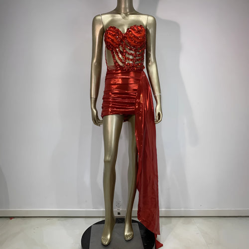 Red two-piece stage costume skirt suit with see-through mesh panels and a form-fitting spandex design.
