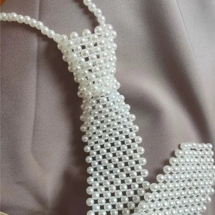 Women's pearl tie body chain jewellery with hollow-out retro design and alloy fastening