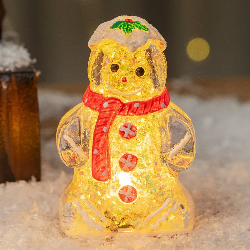 Glowing LED Christmas gingerbread man and snowman ornaments with removable scarves in different colours.