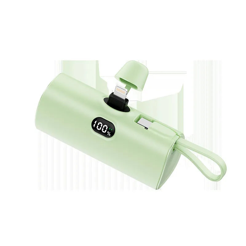Capsule-shaped digital display wireless power bank with built-in plug in multiple colours.