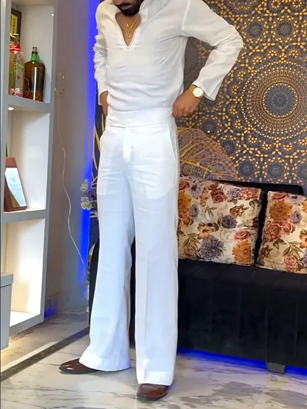 White polyester three-piece men's outfit showing V-neck shirt, sleeveless vest, and full-length trousers