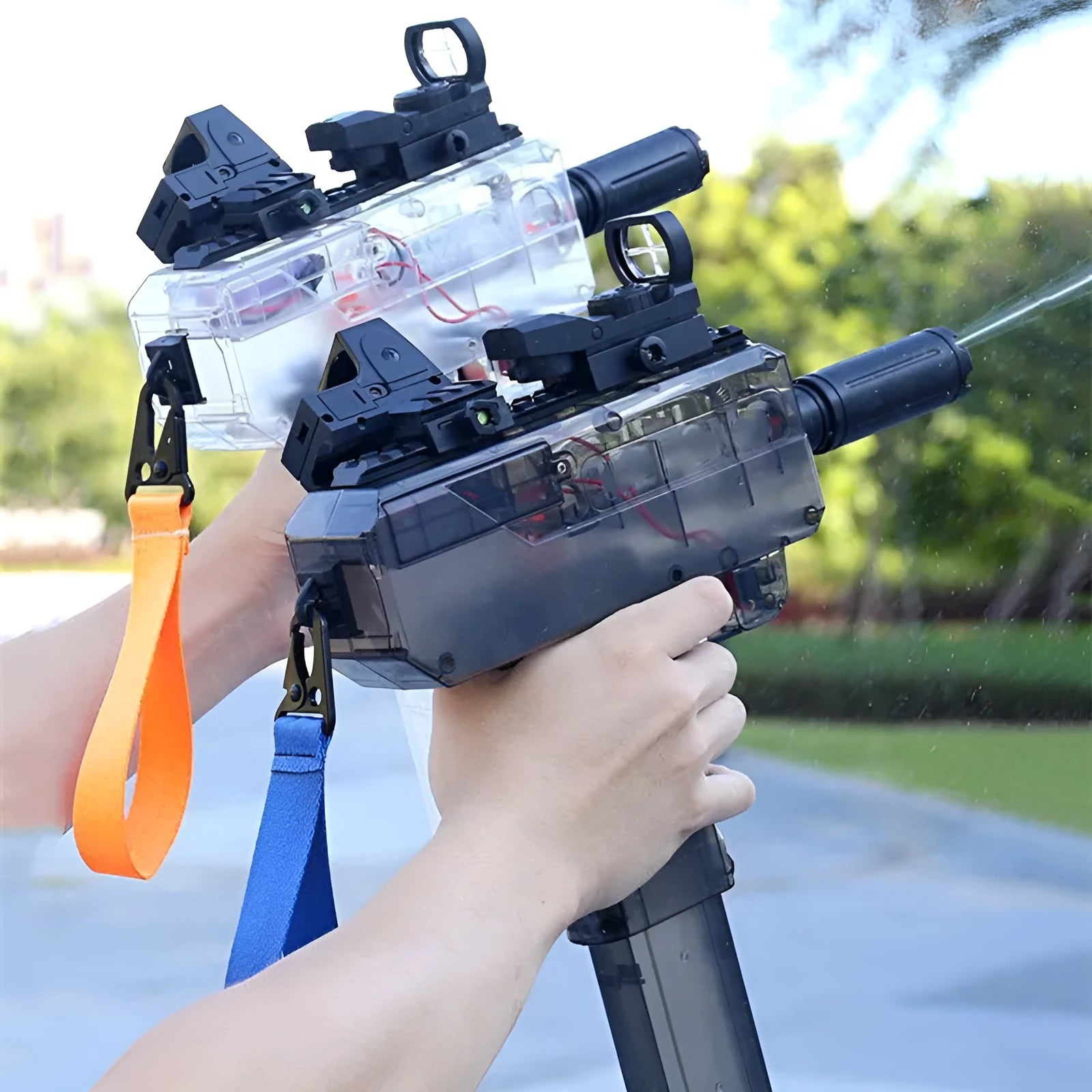 Electric rechargeable water gun toy with transparent casing showing internal mechanism and water