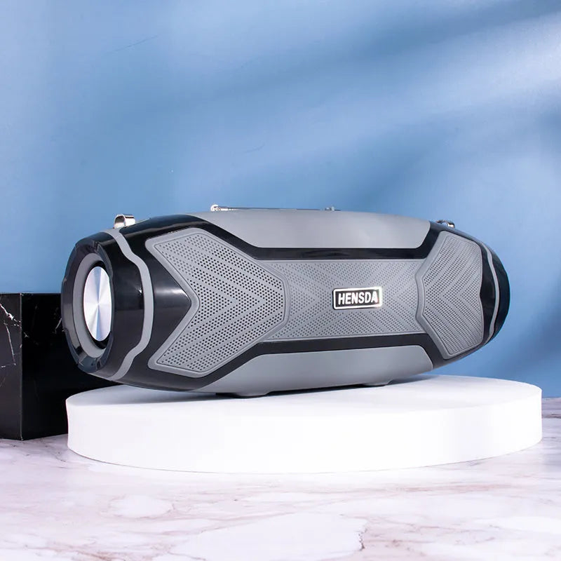 Small portable Bluetooth speaker in choice of five colours with buttons for control and a USB port.