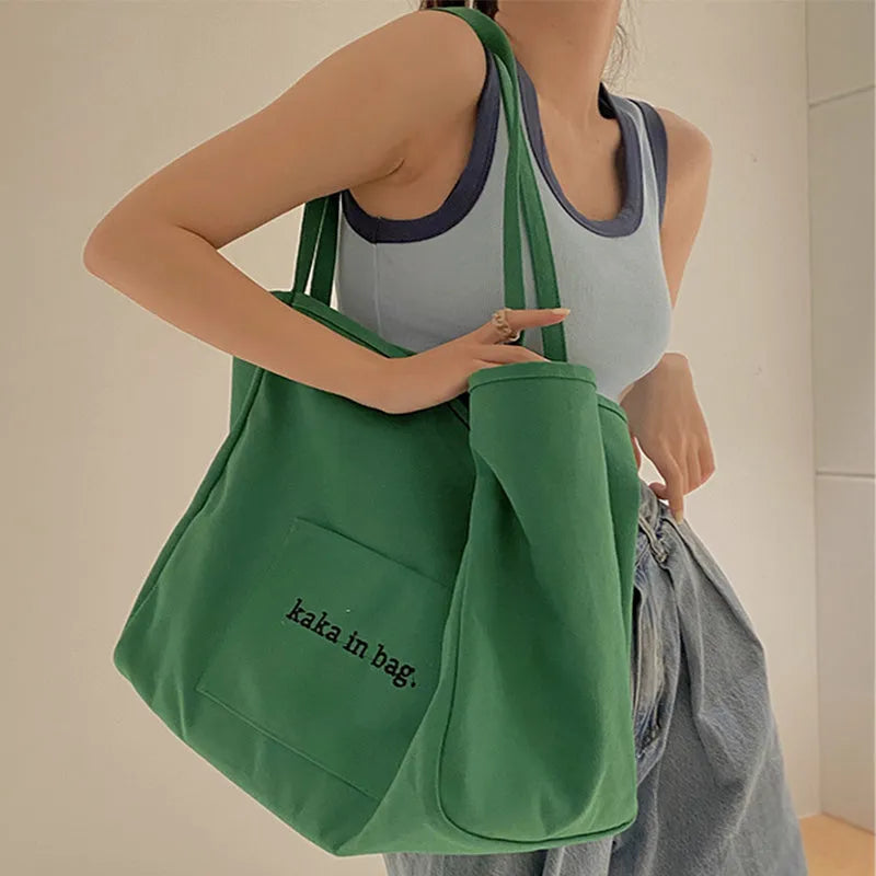 Large capacity canvas shopping tote bag in solid colour, suitable for shoulder carry