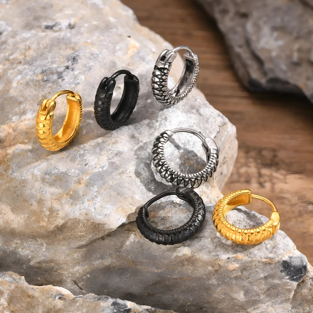 A pair of men's stainless steel earrings featuring a black snake pattern design, shown front-on.