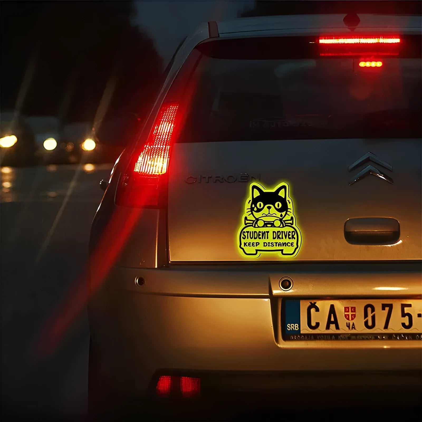 Three magnetic reflective stickers featuring cat, panda, and duck designs with reflective surfaces