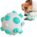 Blue green and yellow nylon dog teething chew ball with textured bumps and hollow treat-dispensing centre.