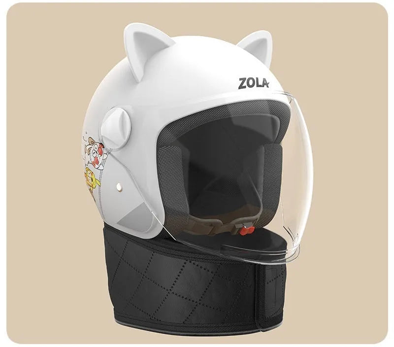 Blown Away winter cycling helmet with attached fleece scarf and clear anti-fog visor on a handlebar.