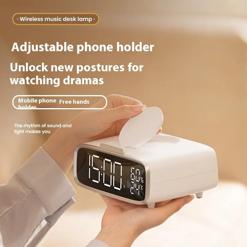 White round Bluetooth speaker wireless charger alarm clock with night light on bedside table