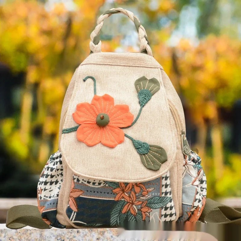 Ethnic style retro canvas backpack with floral print and outer pocket, soft construction for leisure travel
